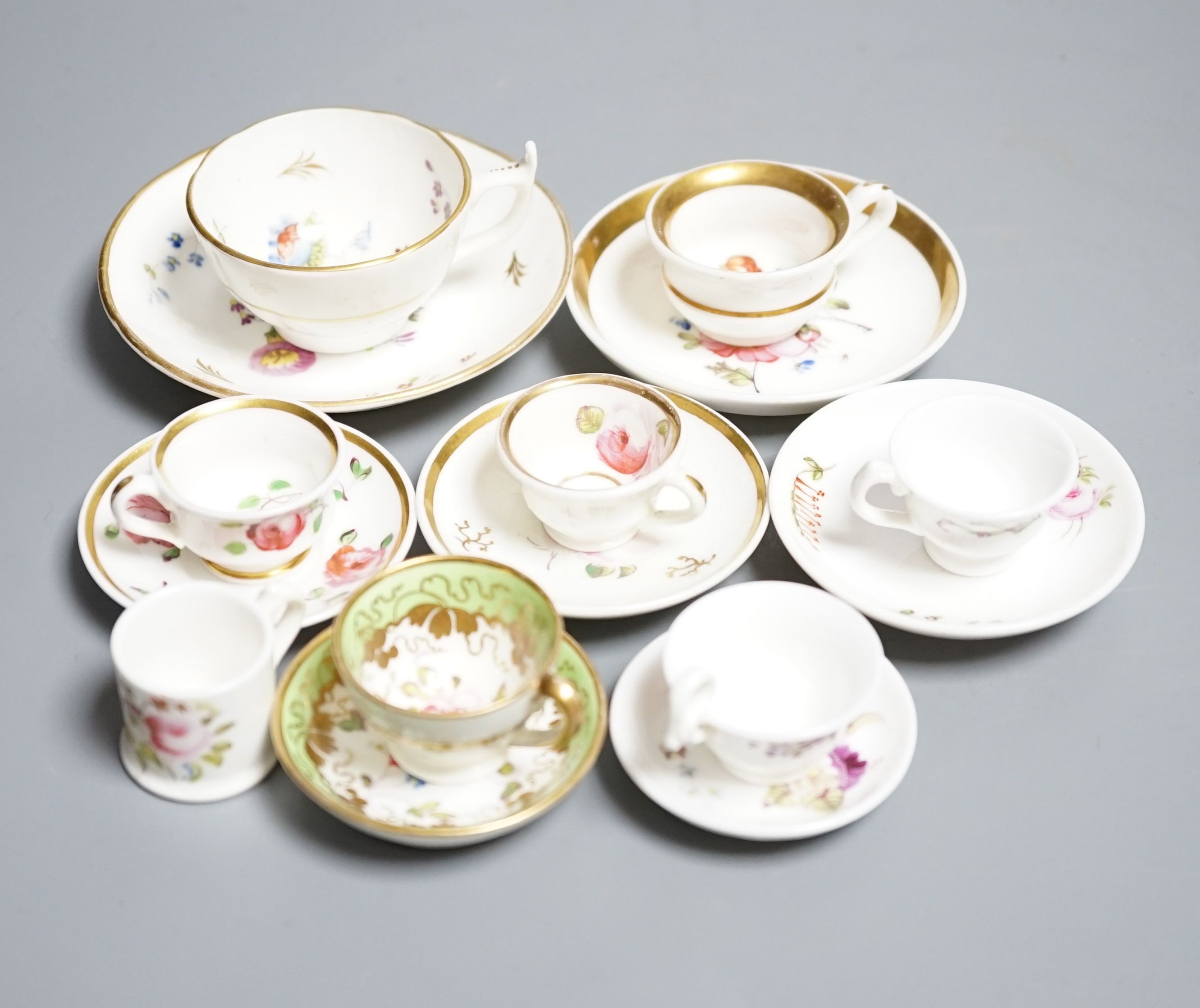 Seven Staffordshire or Alcock miniature teacups and saucers and a similar miniature mug, c.1815-20. Provenance - Mona Sattin collection of miniature cups and saucers, collection no.s 144, 148, 151, 152, 155, 161-163